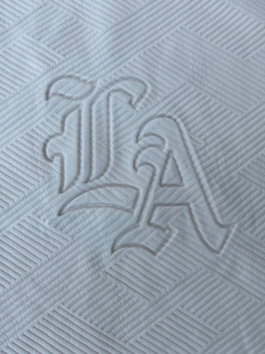 W2494-0912EMB GEO KNIT EMBOSSED L.A CREW NECK BOXY TEE